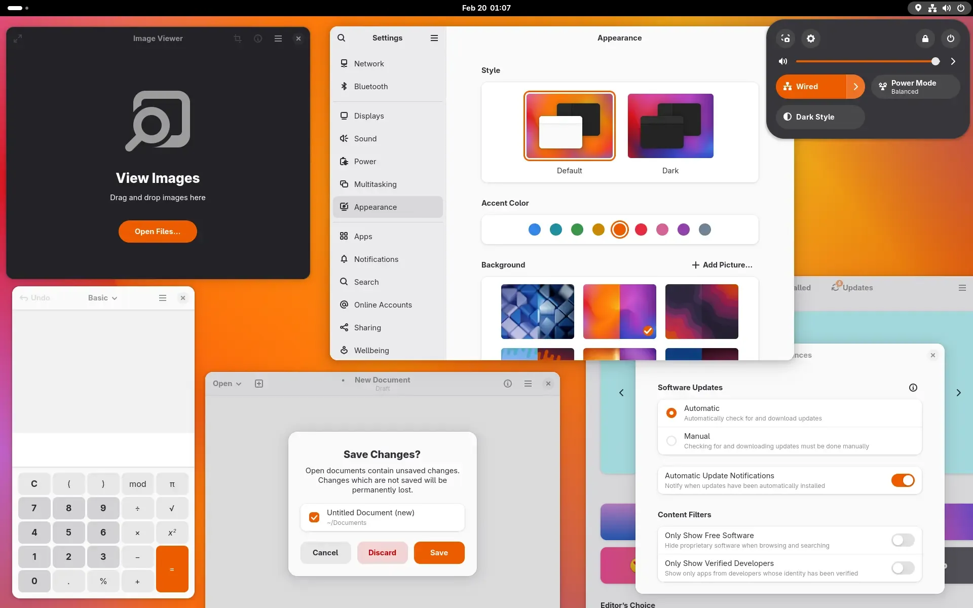 A screenshot of the GNOME desktop, with the accent color set to orange. Several apps are open, and their primary UI element are colored in orange.