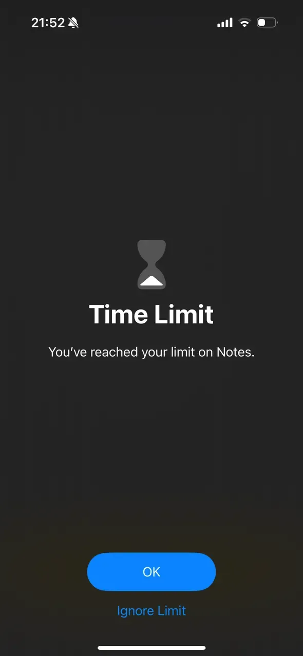 A screenshot of an overlay on top of the iOS Notes app, saying "You've reached your time limit on Notes." It shows a big "Ok" button and a small "Ignore Limit" text.